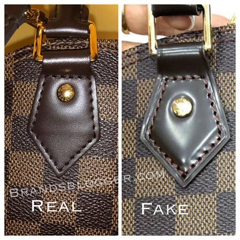 how to tell louis vuitton purse is fake|authenticate louis vuitton.